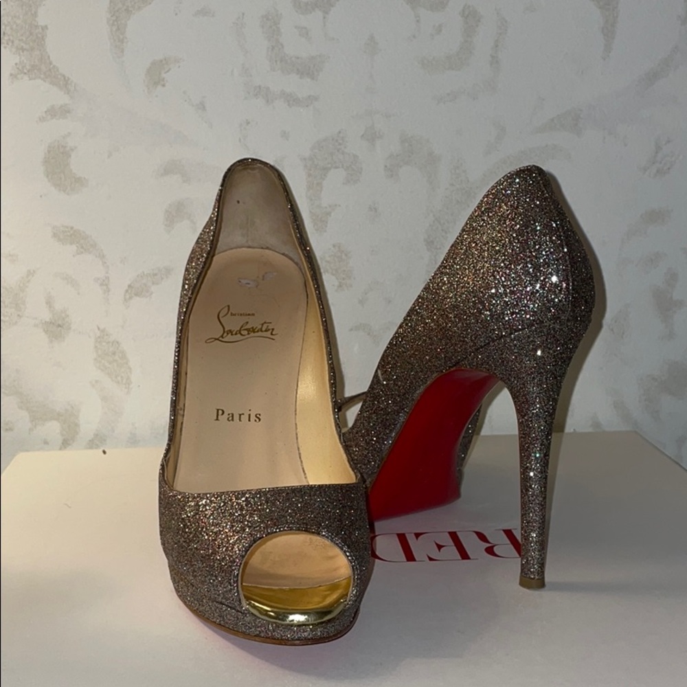 CHRISTIAN LOUBOUTIN HEELS!!